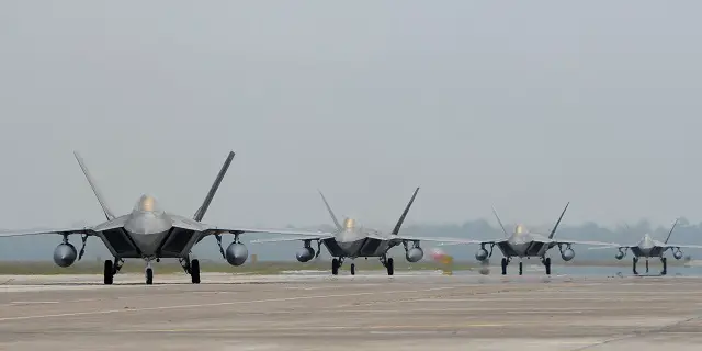 Four F-22 Raptors return to Tyndall after a six month deployment to Southeast Asia April 14. More than 200 Airmen deployed from the 95th Fighter Squadron, the 325th Operation Support Squadron, the 325th Maintenance Squadron, the 325th Aircraft Maintenance Squadron and other offices make history by completing the first Tyndall and F-22 Raptor combat deployment. (U.S. Air Force photo by Senior Airman Alex Echols/Released)