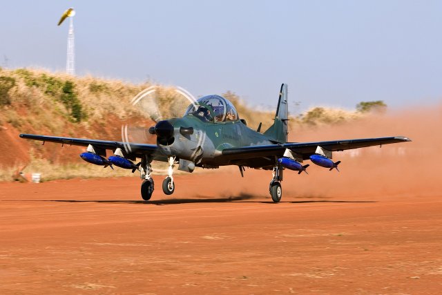 Embraer Defense & Security and the Ministry of Defence of the Republic of Ghana have signed a contract for the acquisition of five A-29 Super Tucano light attack and advanced training turboprops, the Brazilian aircraft manufacturer announced today at Paris Air Show 2015. The contract includes logistic support for the operation of these aircraft as well as the set-up of a training system for pilots and mechanics in Ghana that will provide the autonomy of the Ghana Air Force in preparing qualified personnel.