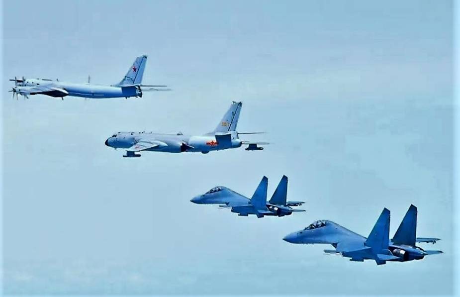 PLA Chinese Air Force J 16 fighter jets deployed in joint strategic patrol with Russian Air Force